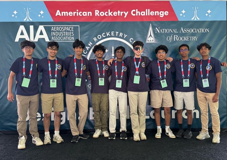 South Brunswick Aerospace Team members at 2025 National Competition with their competition rocket